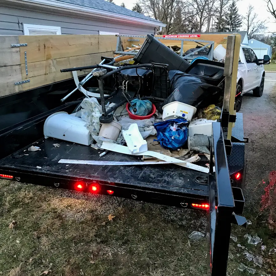 Roll-off dumpster delivered to a residential driveway in Sheffield